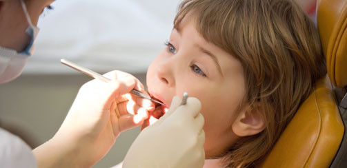 Лечение молочных зубов у детей